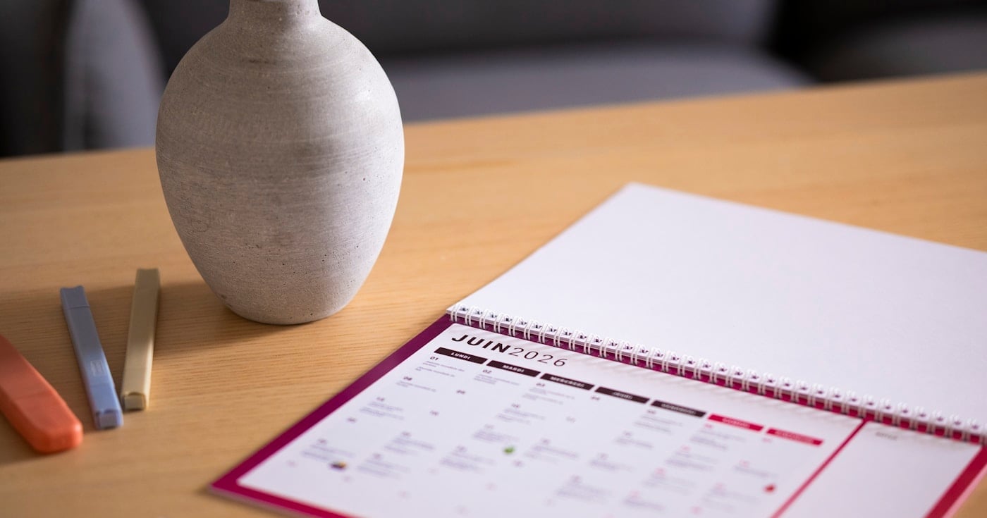 Four-day work week statistics — calendar on a desk